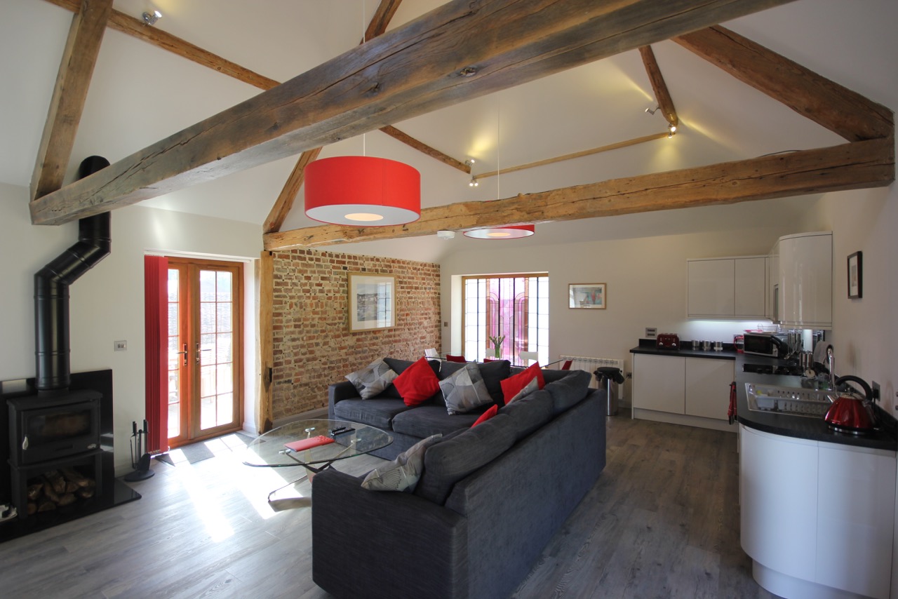 Open beams in the living area of Flinstone cottage