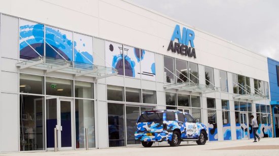 The front of the Air Arena with blue camo vehicle outside