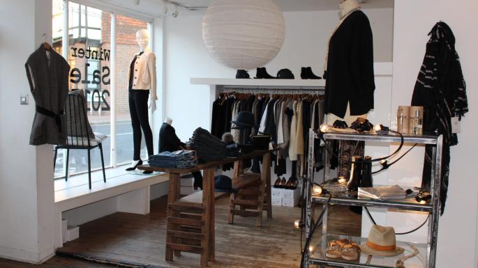 Inside of Neilson Boutique showing a collection of fashion and accessories