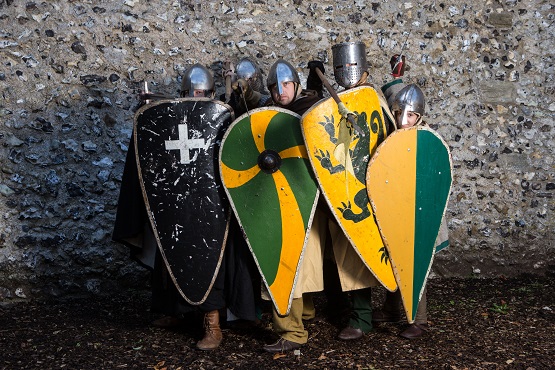 Arundel castle's Norman Knights with colourful historic shields and armour