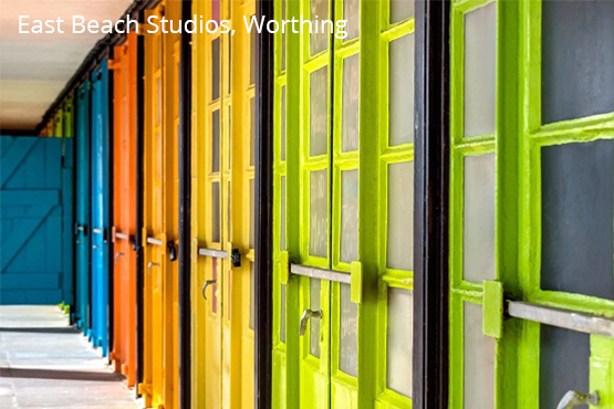 Colourful doors at the Each Beach Studios in Worthing