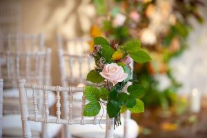Cowdray wedding flowers tied to a chair