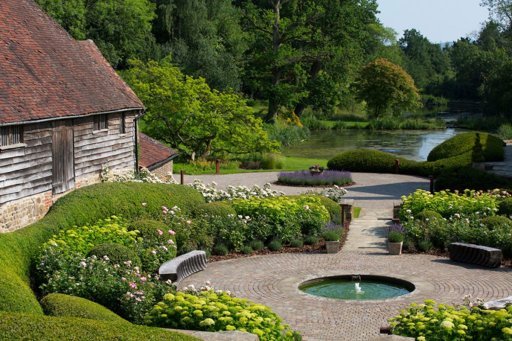 Beautiful gardens, paved spaces and water at Nyetimber vineyard
