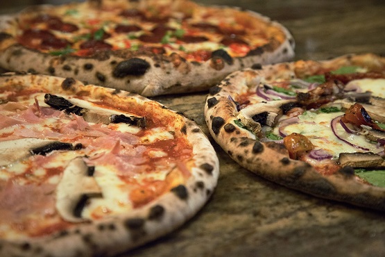 Three wood-fired oven pizzas at The Real Pizza Company in Copthorne