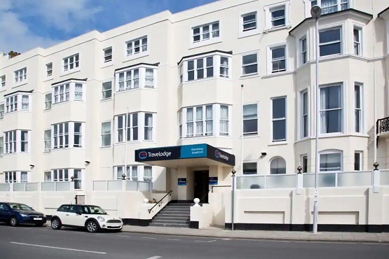 Road and front entrance of Travelodge Worthing Seafront