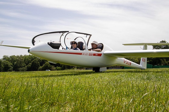 Two passengers in a plane at the Southdown Gliding Club