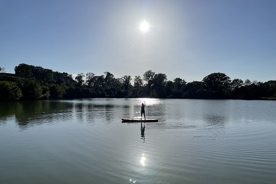 Paddle boarding in a reservoir