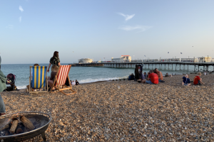 A beach bbq on Worthing beach overlooking the pier